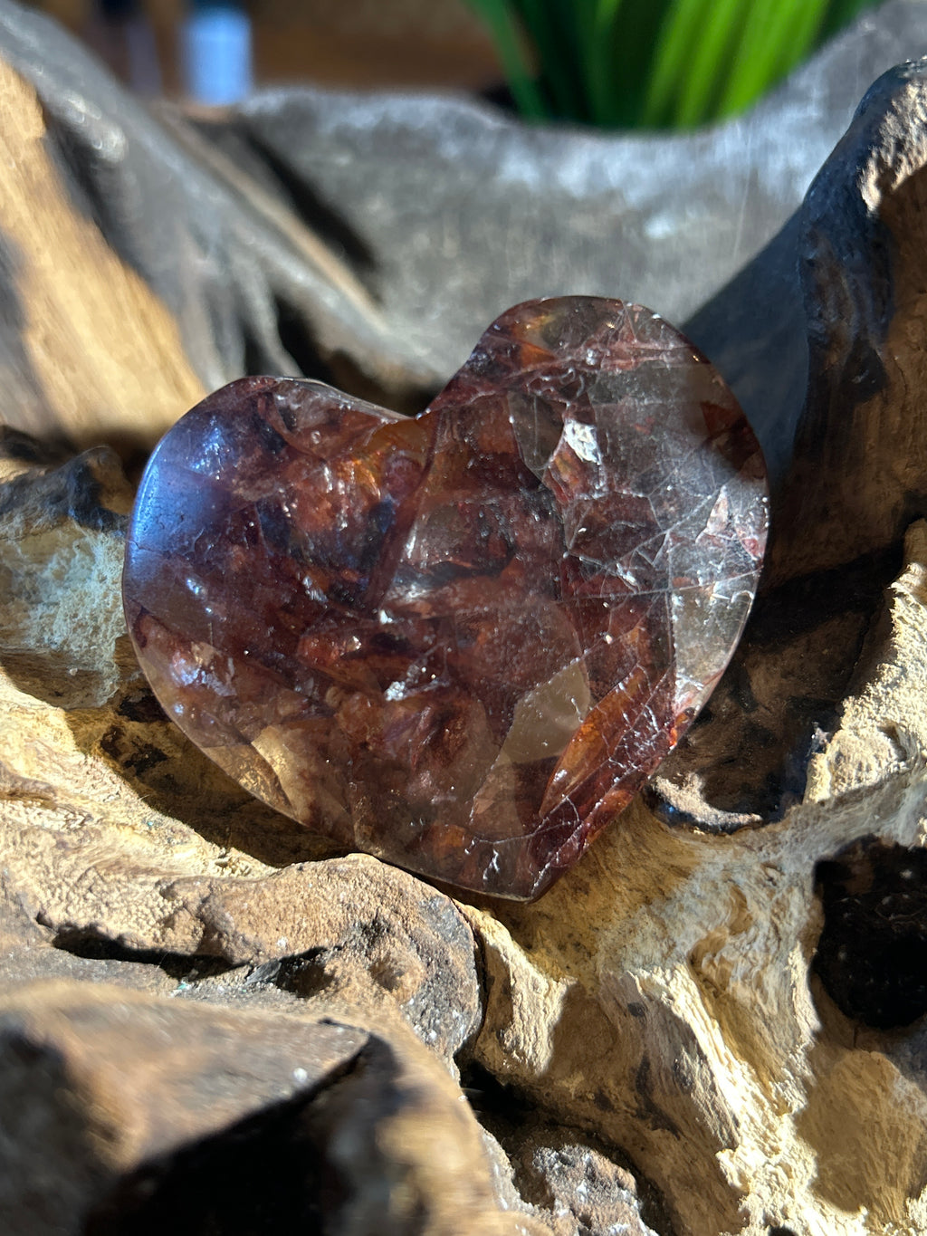 This exquisite Fire Quartz heart, measuring 2.5 inches wide and 2 inches high,