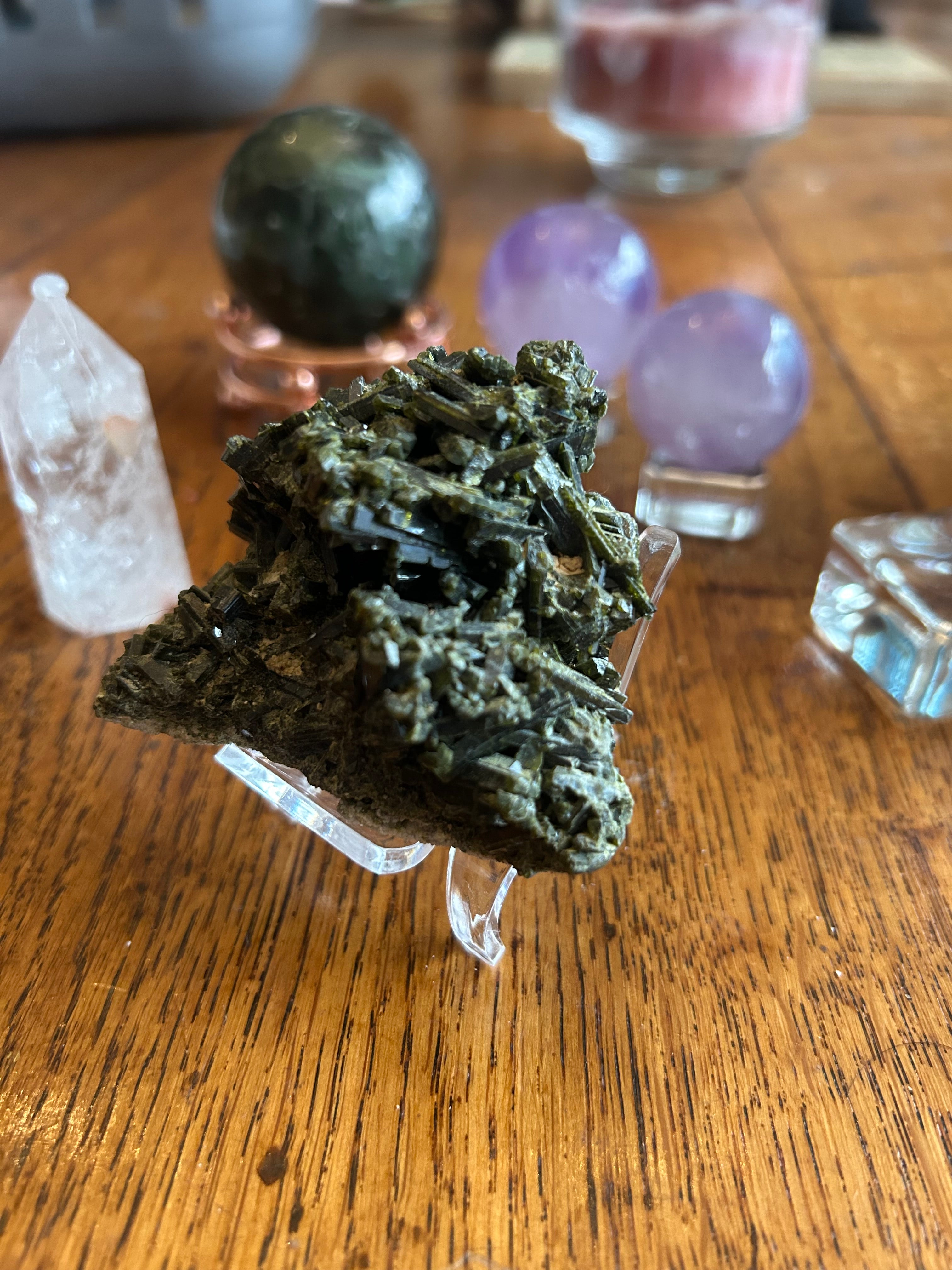 This is a cluster of dark green epidote crystals